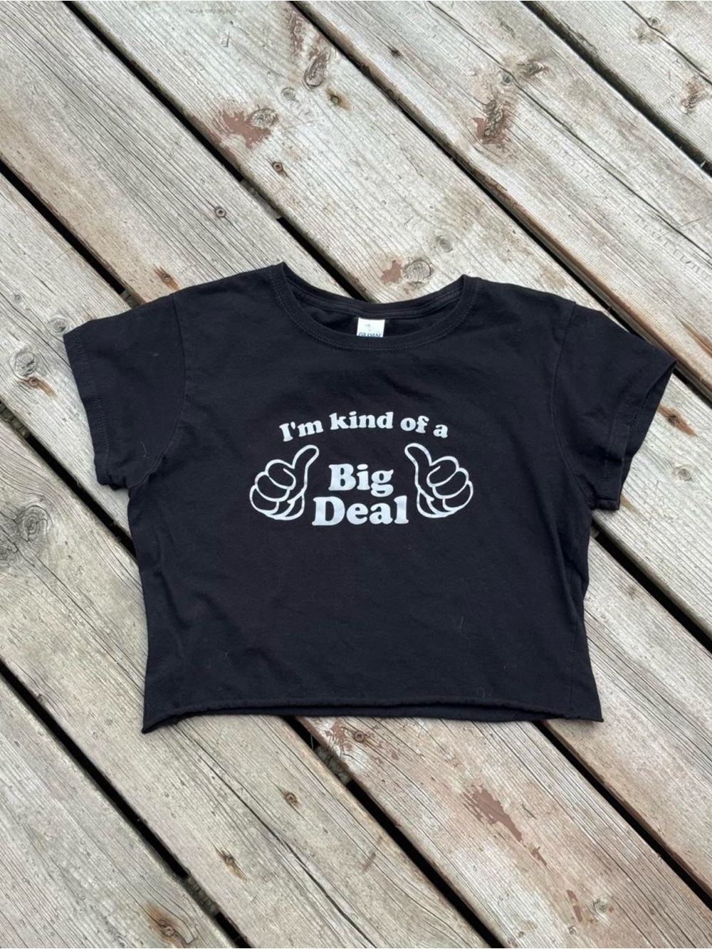 'I'm kind of a Big Deal' raw hem cropped baby tee with white text